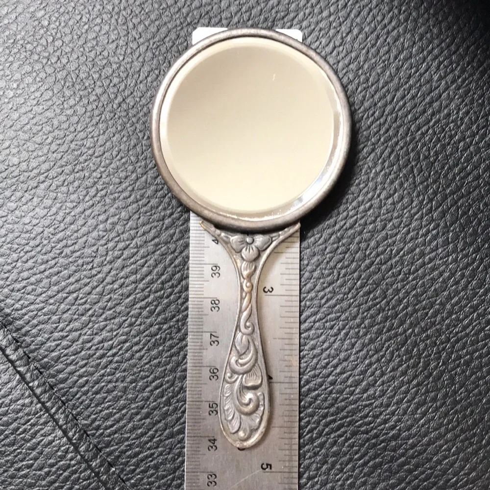 Antique petite hand mirror